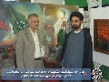 المعرض الاول لمسابقة الفنون التشكيلية / مدير المركز مع معاون عميد جامعة الطوسي