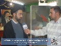 المعرض الاول لمسابقة الفنون التشكيلية / مدير المركز مع قناة العراقية