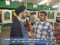المعرض الاول لمسابقة الفنون التشكيلية / مدير المركز مع اذاعة المعارف